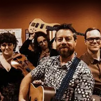Danny Frank & The Smoky Golds group holding instruments.