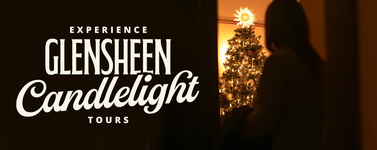 the shadow of a girl looking at a lit up christmas tree in a doorway: Experience Glensheen Candlelight Tours.