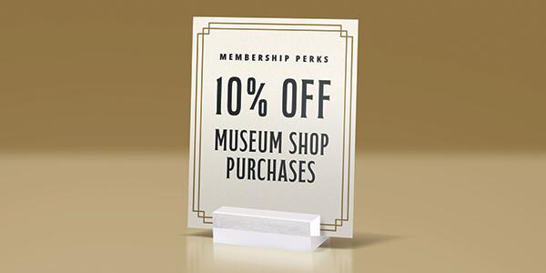 small sign that reads: Membership Perks, 10% Off Museum Shop Purchases.
